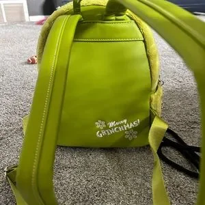 Brand new lounge fly grinch backpack. Never used. Amazon.com | Loungefly Dr. Seuss main image 2